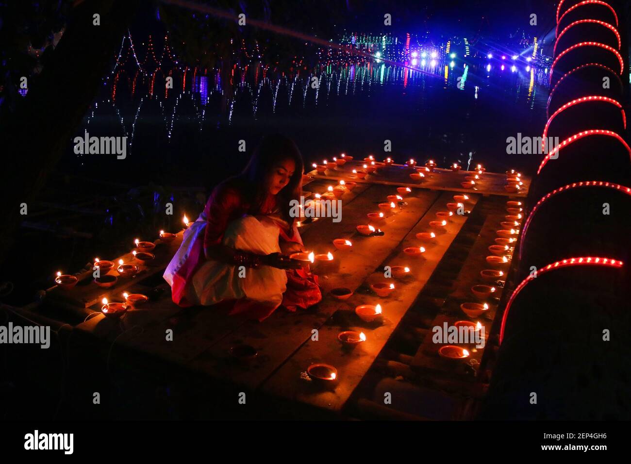 A Bangladeshi Girl Lights Oil Lamps As She Celebrates The Diwali Festival At A Temple In Dhaka The Diwali Festival Of Lights Symbolizes The Victory Of Good Over Evil Commemorating Lord Ram S Return To His Kingdom Ayodhya After Completing His 14 Year In Exile A Bangladeshi Girl Lights Oil Lamps As She Celebrates The Diwali Festival At A Temple In Dhaka The Diwali Festival Of Lights Symbolizes The Victory Of Good Over Evil Commemorating Lord Ram S Return To His Kingdom Ayodhya After Completing His 14 Year In Exile