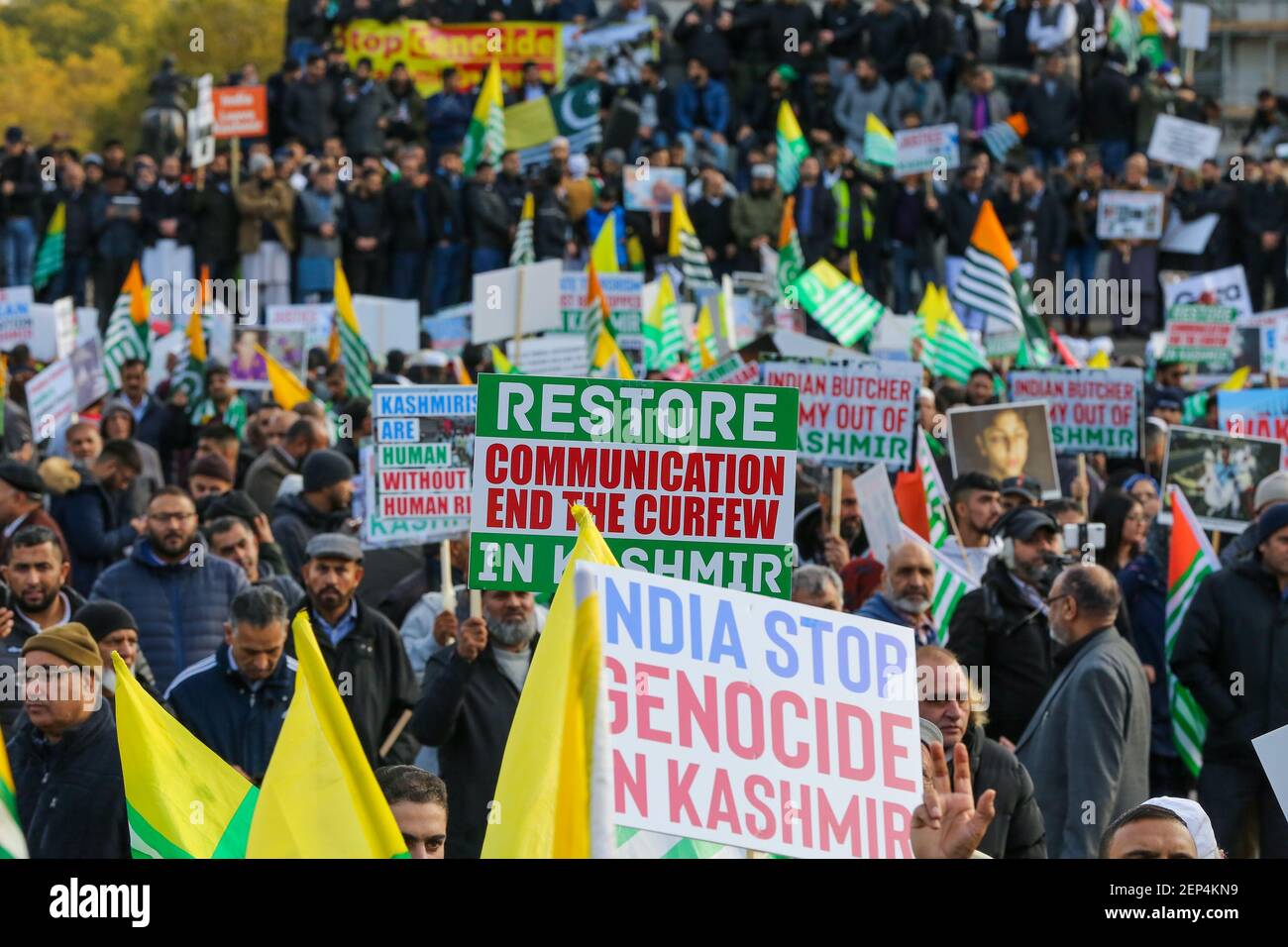 Crowd Of Kashmir Supporter With Placards And Kashmiri Flags During A crowd-of-kashmir-supporter-with-placards-and-kashmiri-flags-during-a