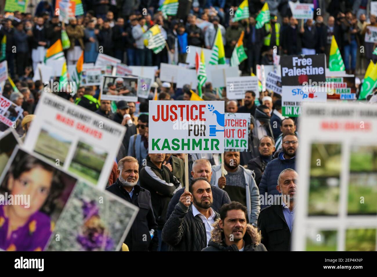 Crowd of Kashmir supporter with placards and Kashmiri flags during a rally  in Trafalgar Square on Diwali Day. The protest marked an important date for  Kashmiris: 27 Oct 1947, the day the