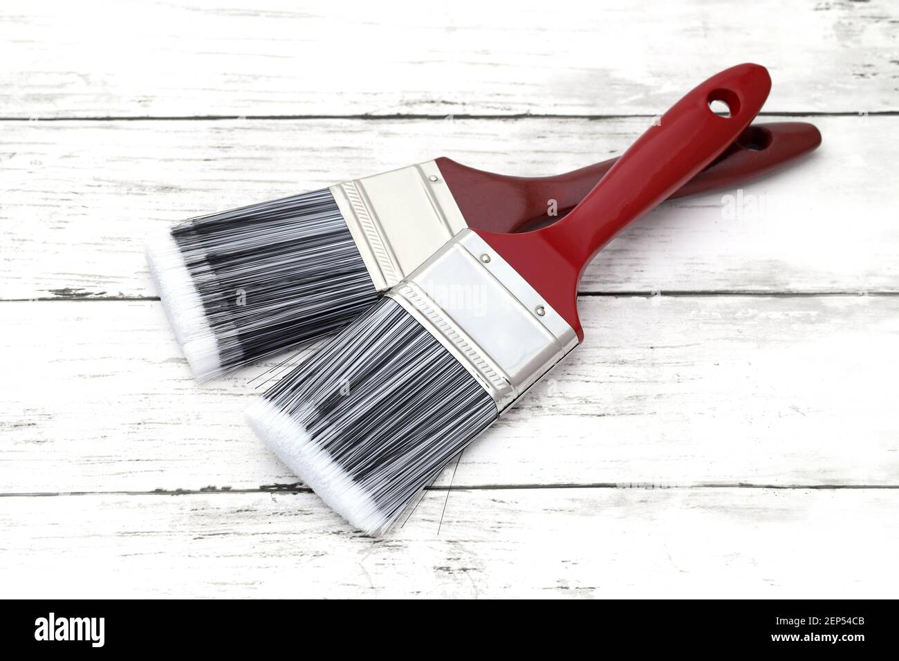 paint brush on grunge wood plank background Stock Photo