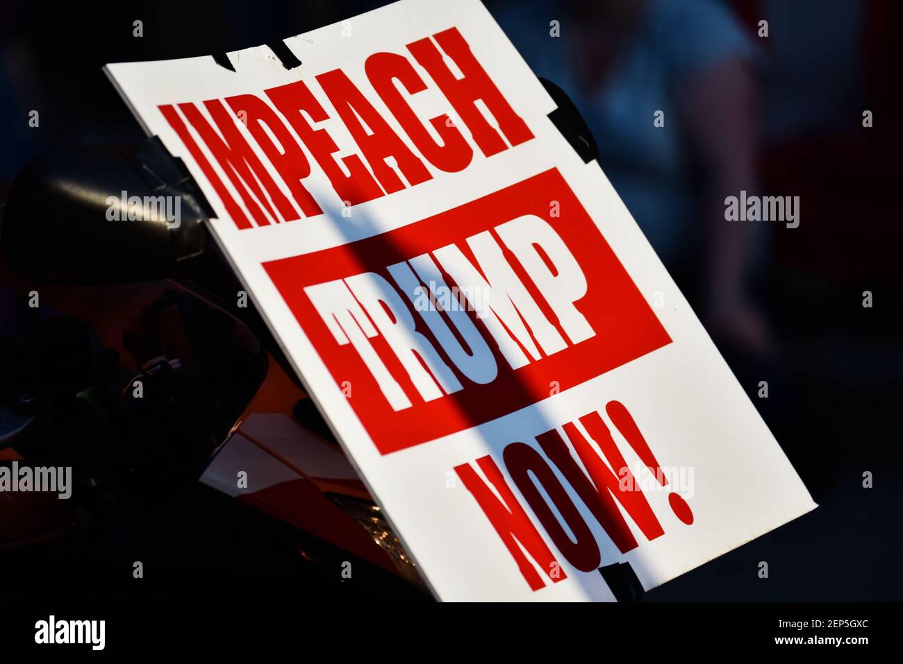 Impeach Trump Now signs indicates displeasure with Donald Trump, July 4th parade, Montpelier, VT, USA. Stock Photo