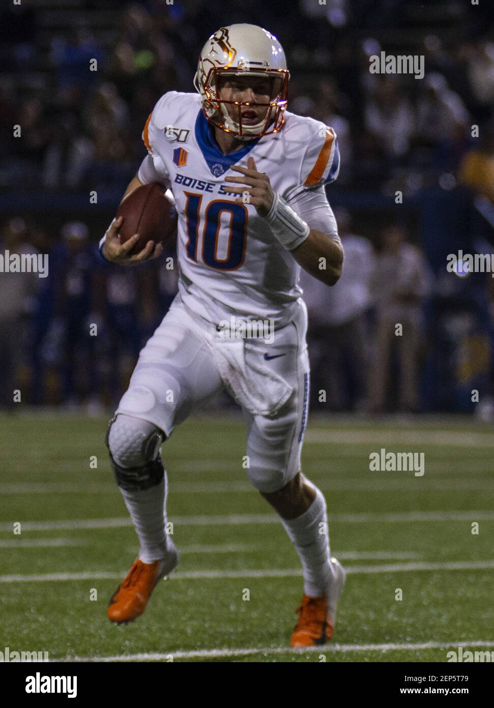 BOISE, ID - NOVEMBER 9: Boise State Broncos (10) Chase Cord (QB) looks for  open receivers during a college football game between the Boise State  Broncos and the Wyoming Cowboys on November