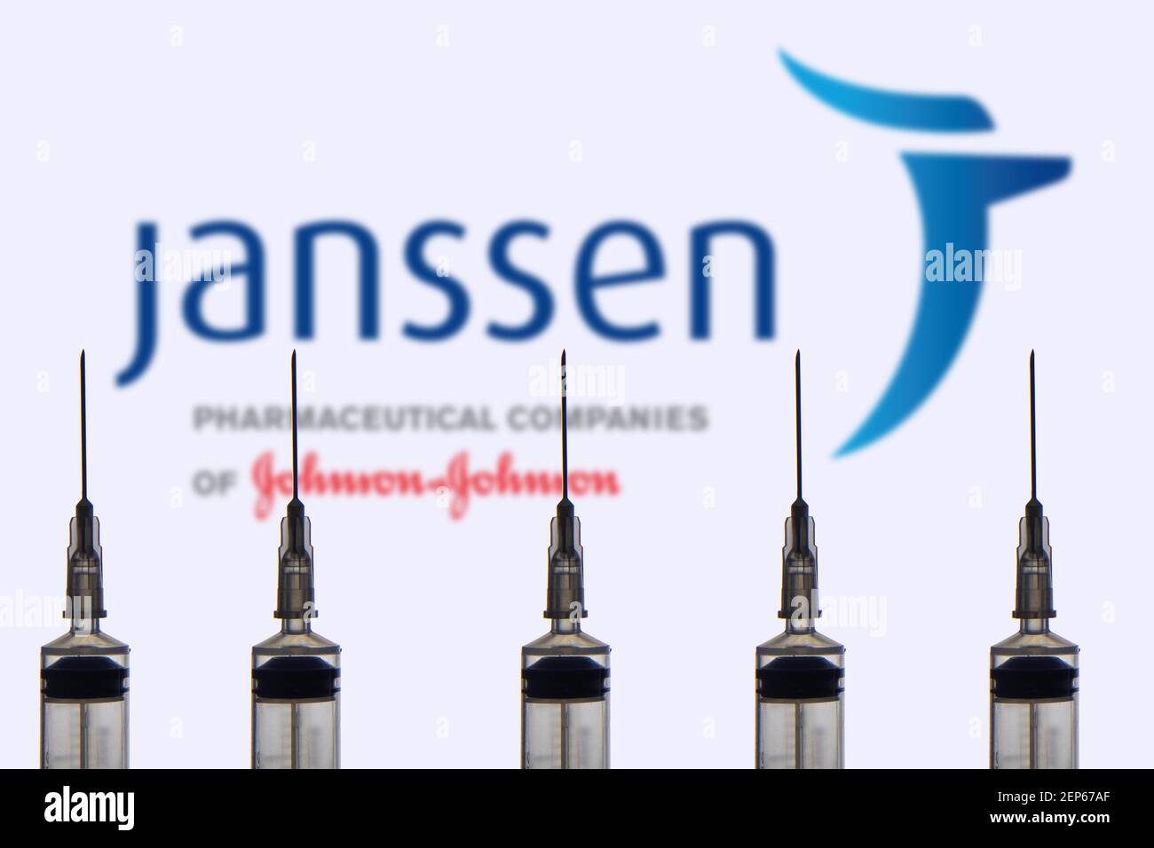 Kathmandu, Nepal - February 26 2021: Janssen Pharmaceutical Companies logo against Syringe or Inject needle. Johnson and Johnson's Coronavirus vaccine Stock Photo
