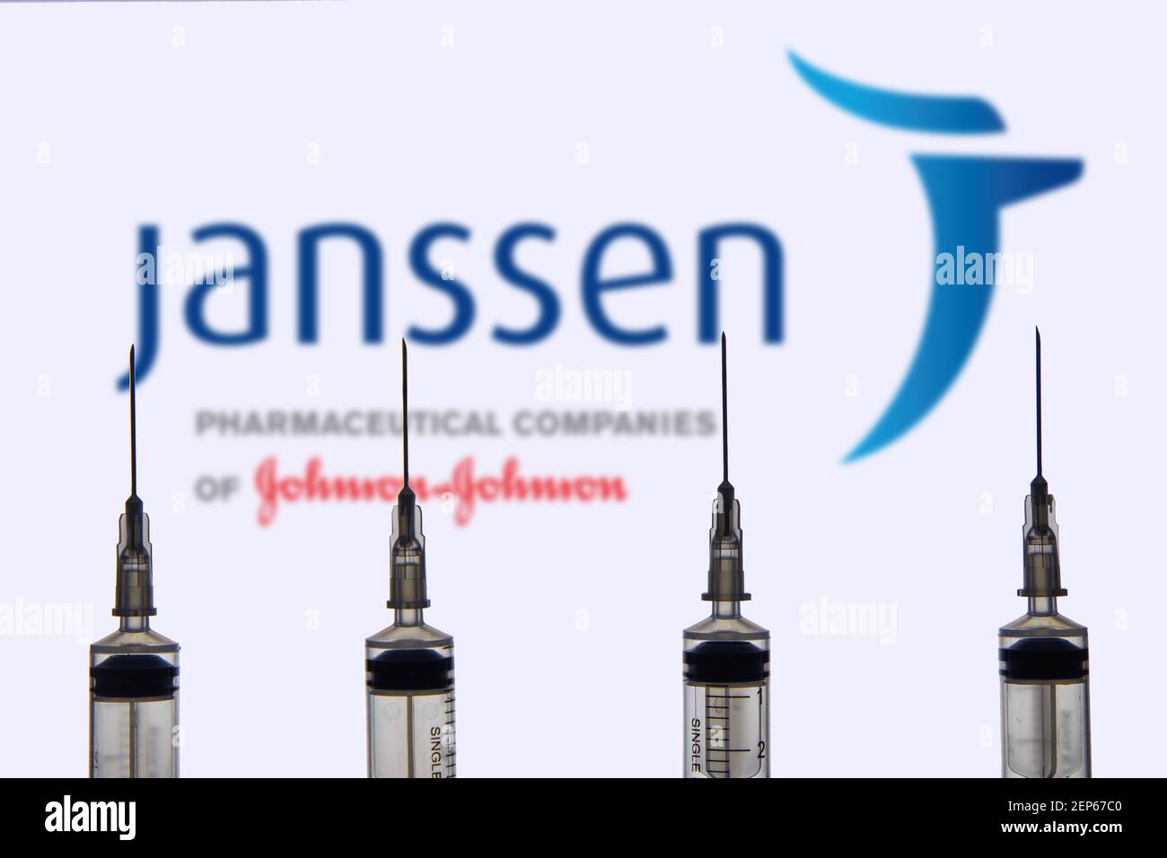 Kathmandu, Nepal - February 26 2021: Janssen Pharmaceutical Companies logo against Syringe or Inject needle. Johnson and Johnson's Coronavirus vaccine Stock Photo