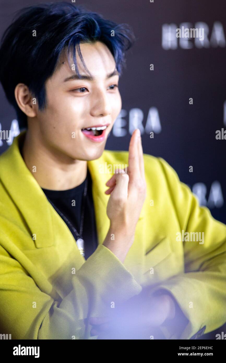 Li Zhenning of Chinese boy band UNINE attends a promotional event by