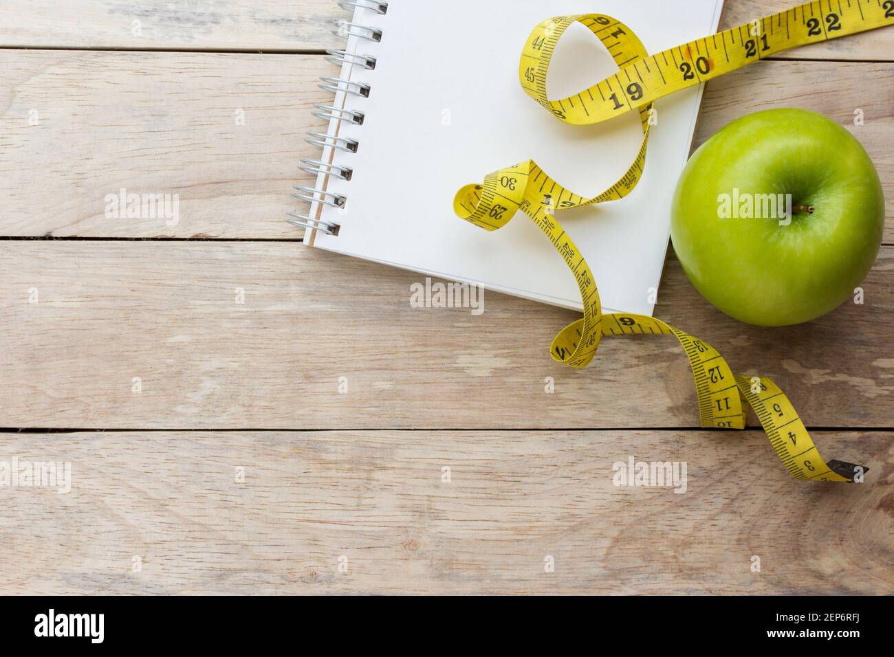 Healthy lifestyle concept with apples. Weight loss or diet concept