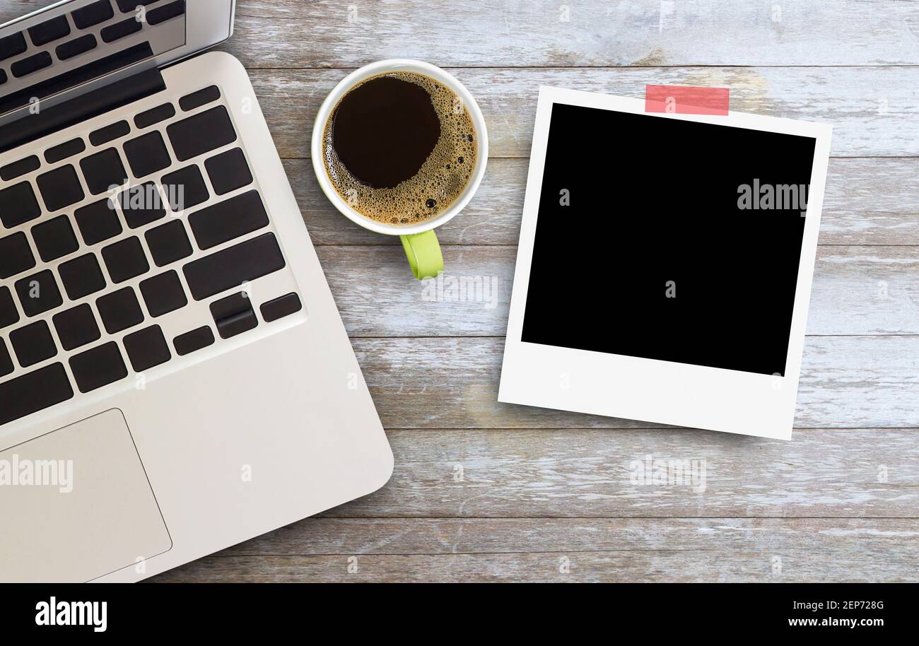 Top view of laptop computer,photo sheet and cup of coffee on brown wood  table  wallpaper for education, business  note of  th Stock Photo - Alamy