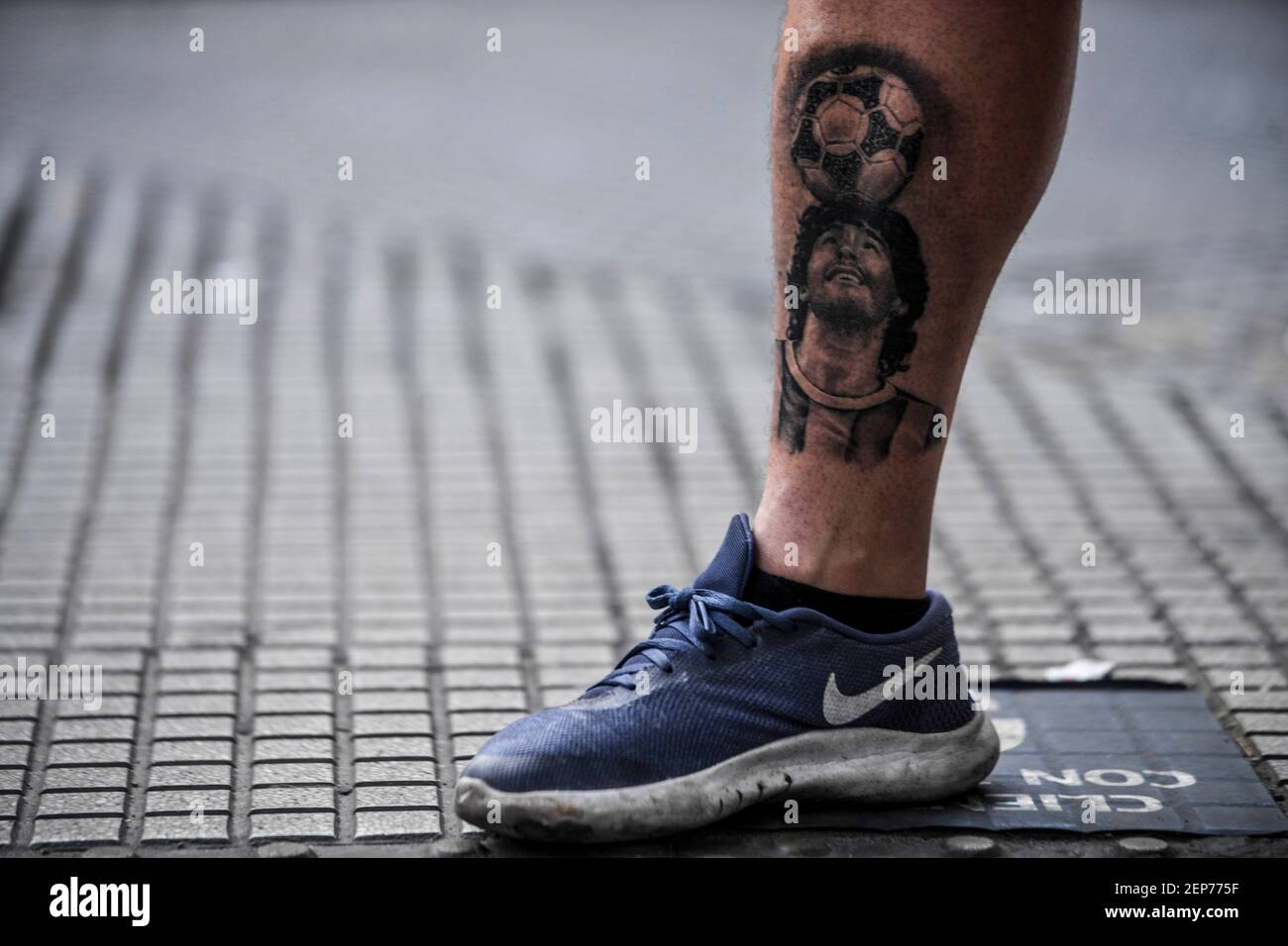 Buenos Aires, Argentina. 16th Feb, 2021. Mariano shows off his tattoo  honoring the late Argentine soccer star Maradona in the Caballito  neighborhood. Thousands of people paraded past the football legend's coffin  amid