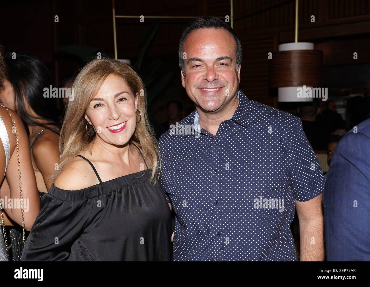 MIAMI, FLORIDA NOVEMBER 08 Jewel Donohue and Jorge Plasencia attend