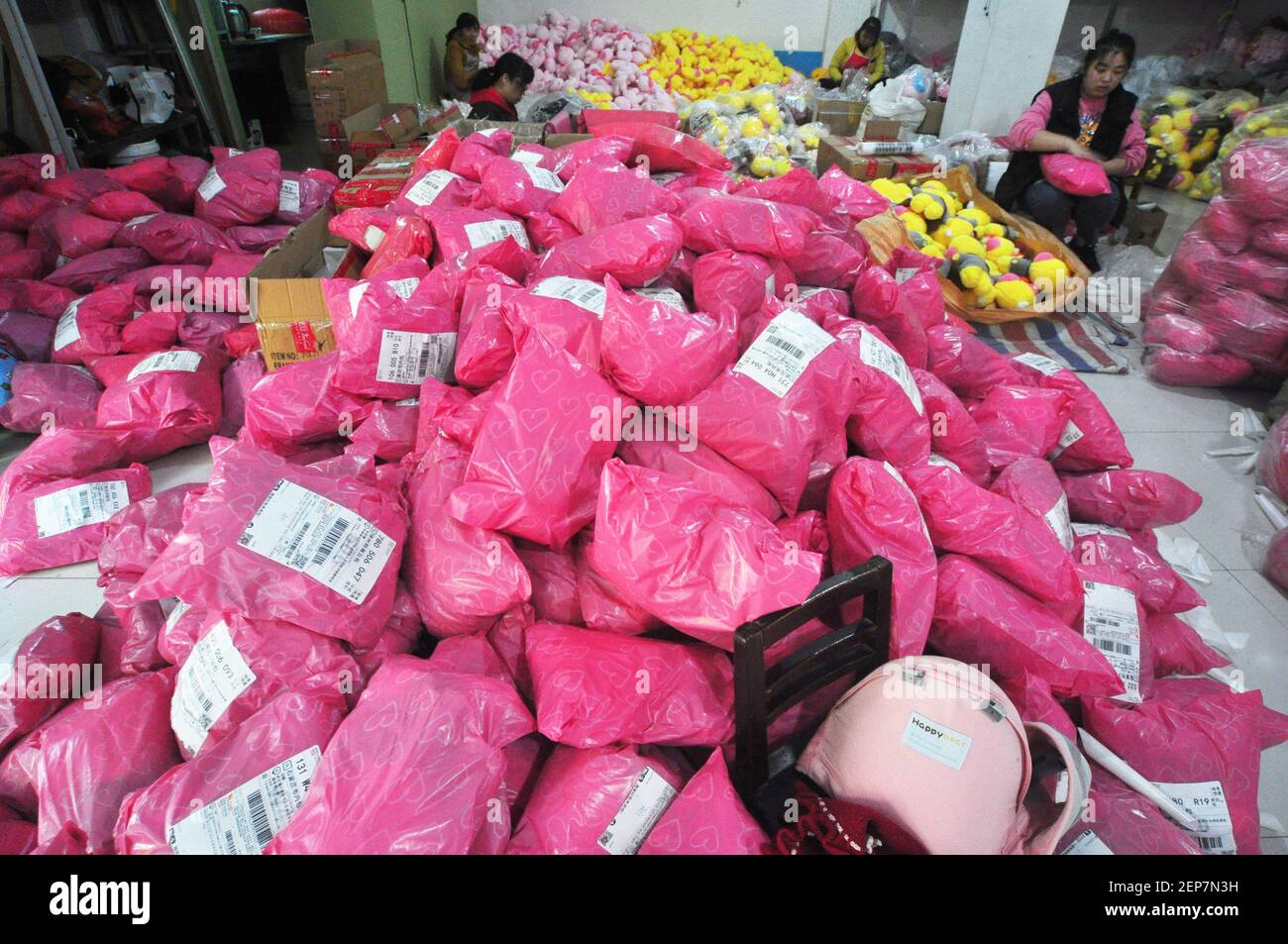 Staff of e-commerce companies work overnight to pack goods for delivery  during Singles Day, a shopping holiday founded by Alibaba and popular among  young Chinese people, in Jinhuai village, a Taobao village
