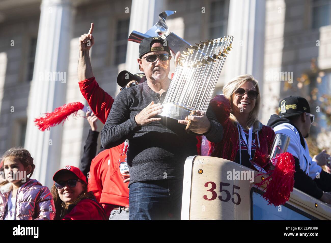 Mike Rizzo put the World Series Trophy on his window sill to celebrate the  Nationals' home opener