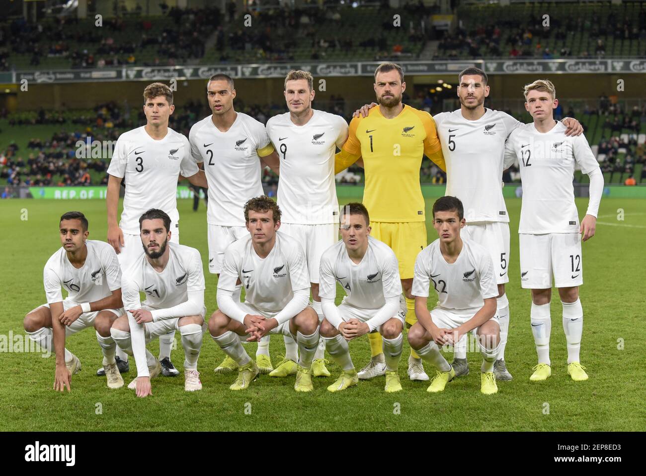 The New Zealand football team poses for a photo during the