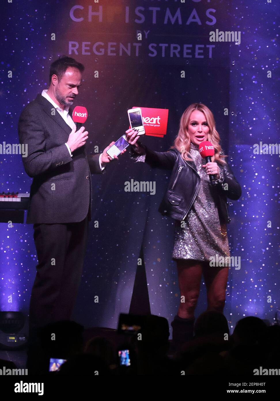 Heart FM Presenters Jamie Theakston and Amanda Holden on stage during