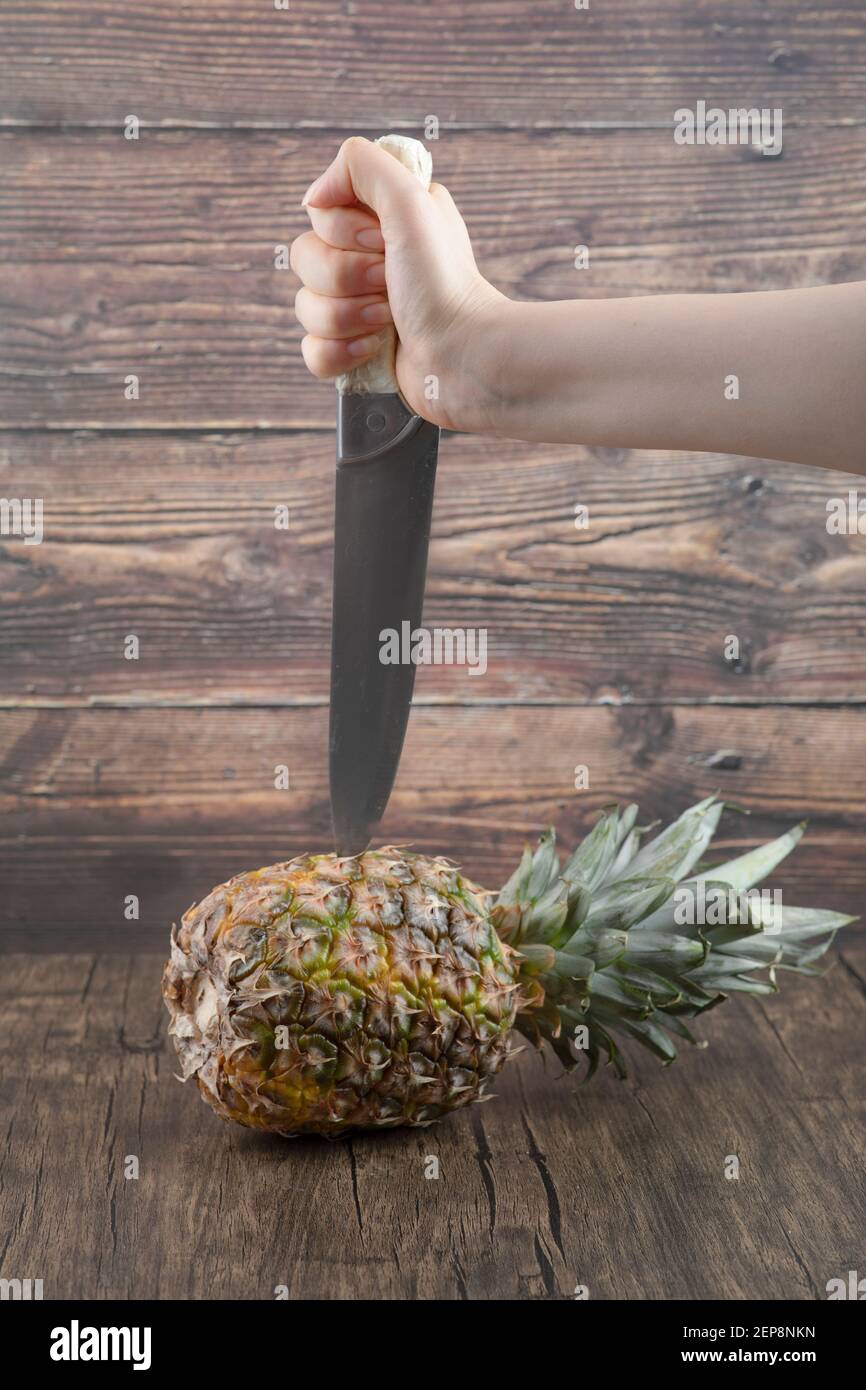 Female hand holding knife cutting hi-res stock photography and images ...
