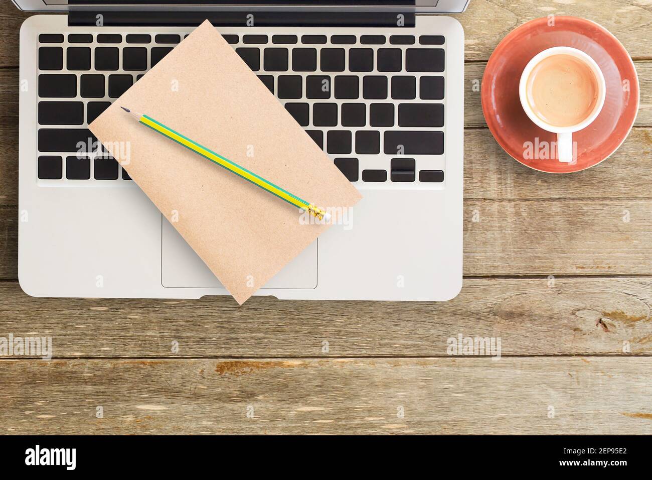 Notebooks and laptop with cup of coffee on office desk or wood table ...