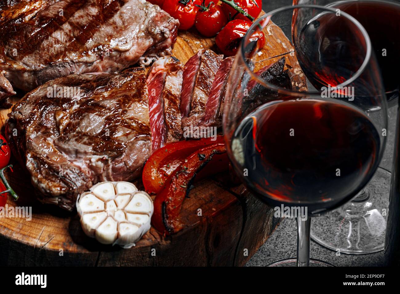 dinner for two with steaks and red wine Stock Photo - Alamy