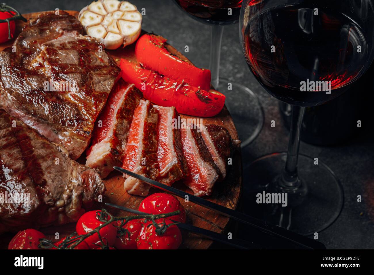 dinner for two with steaks and red wine Stock Photo - Alamy