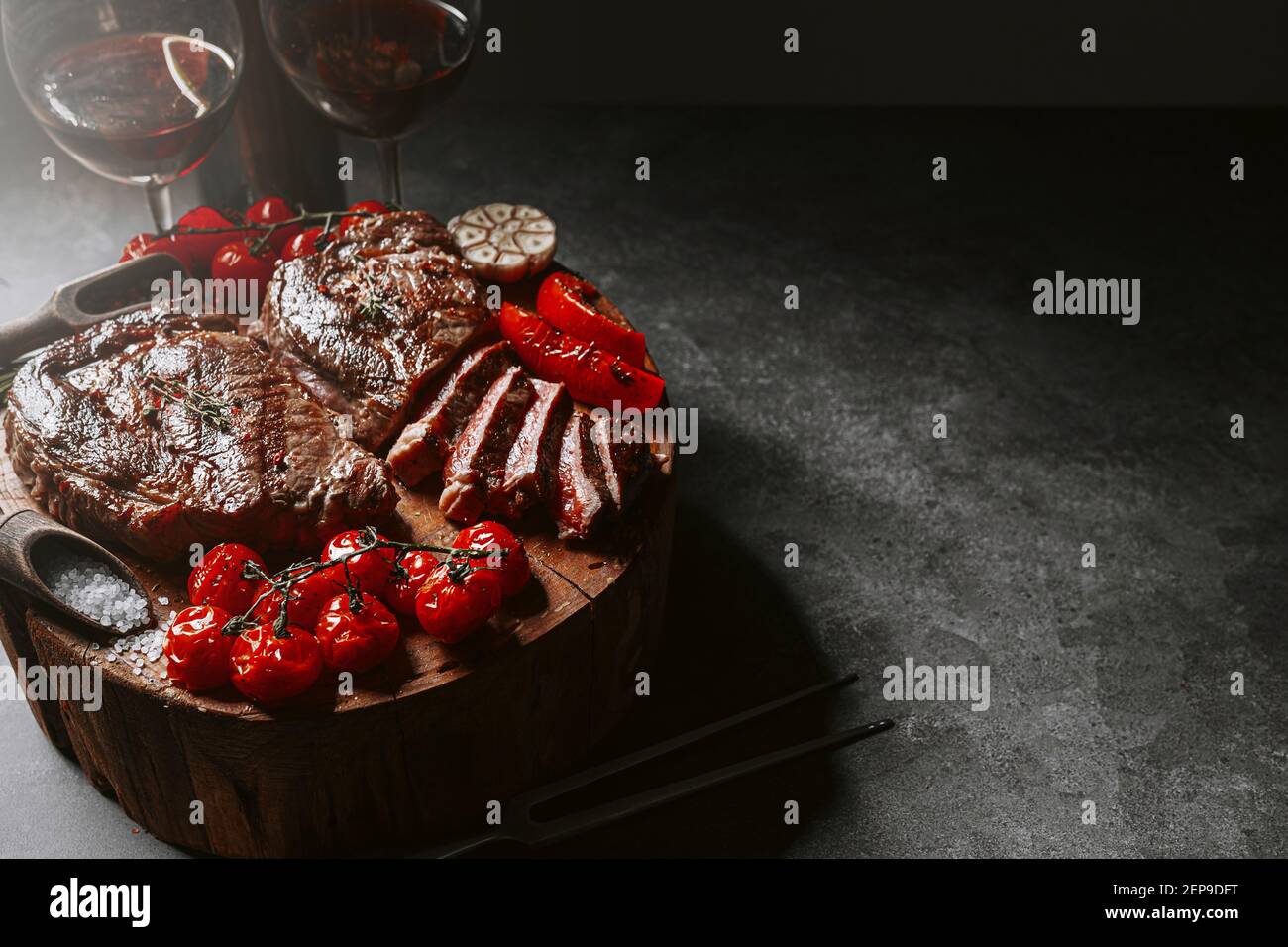 dinner for two with steaks and red wine Stock Photo Alamy