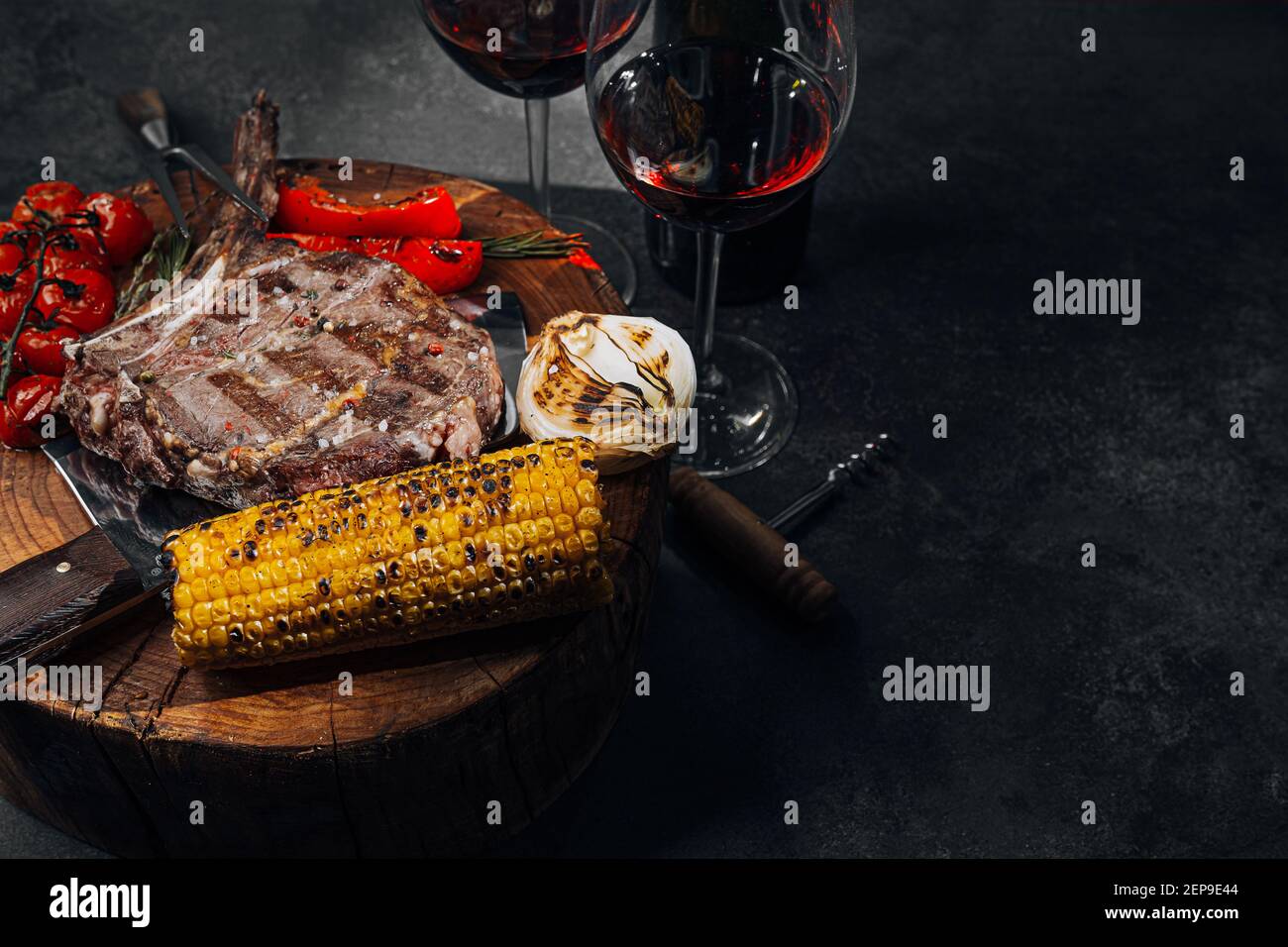 dinner for two with steaks and red wine Stock Photo - Alamy