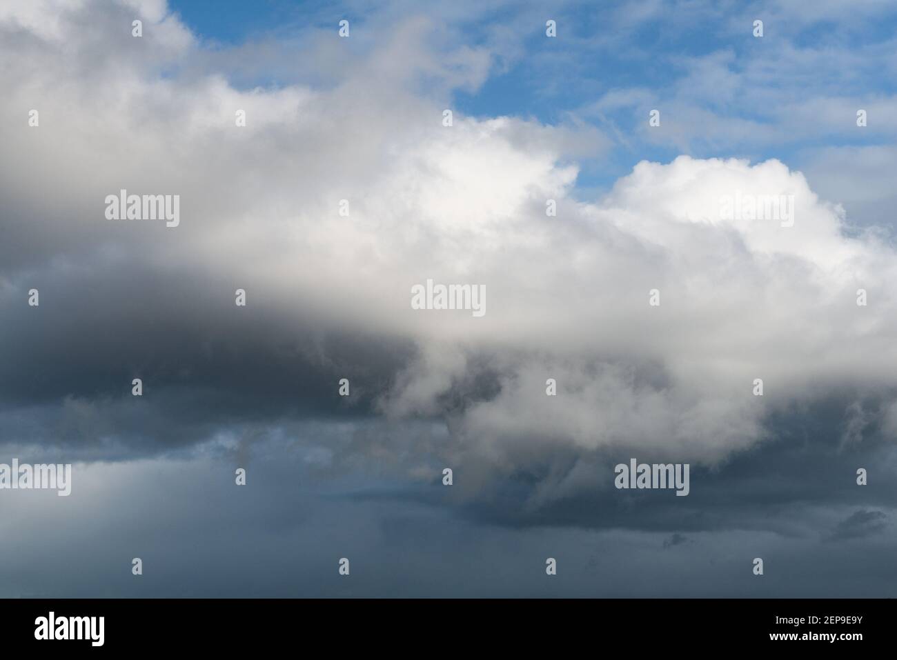Background sky texture with dark and white clouds Stock Photo