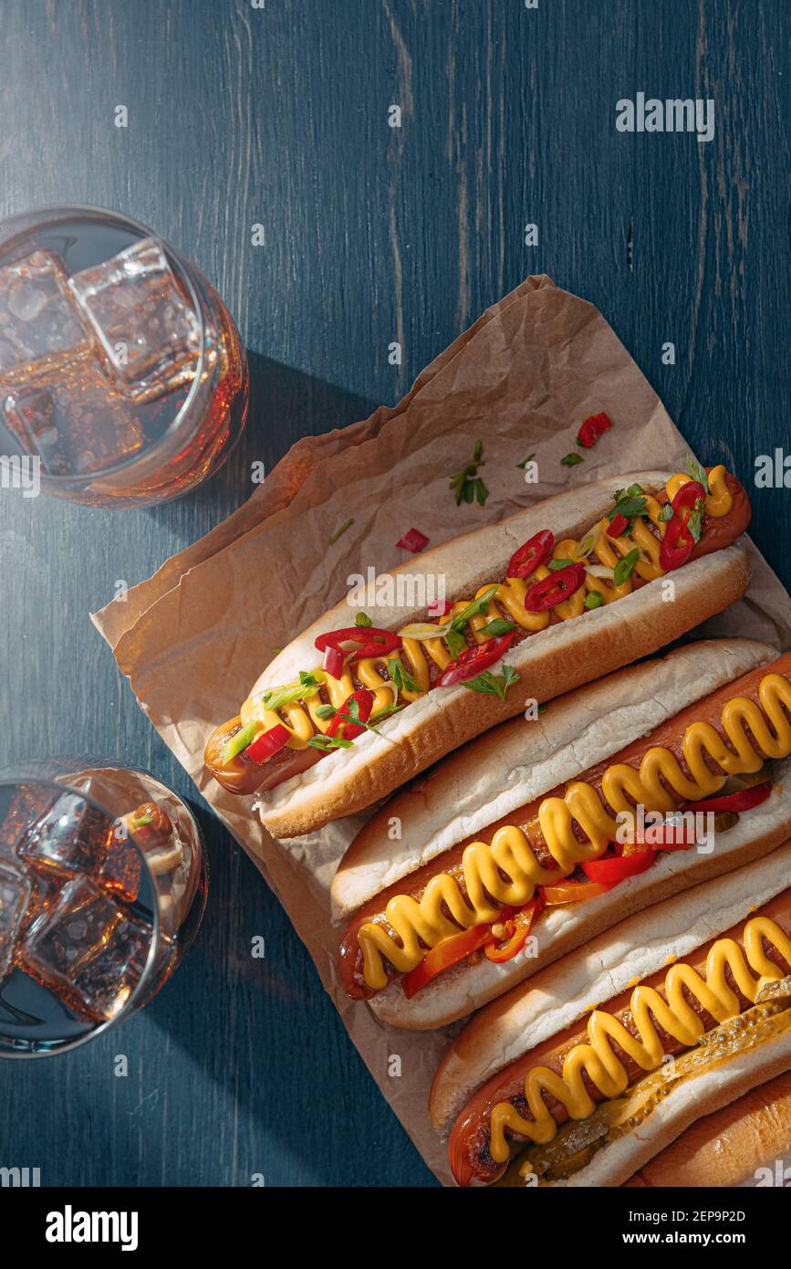 four fresh ready to eat american hot dogs Stock Photo Alamy