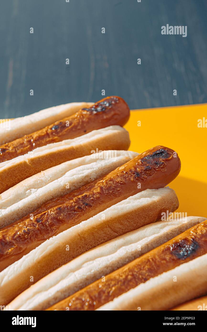 four fresh ready to eat american hot dogs Stock Photo Alamy