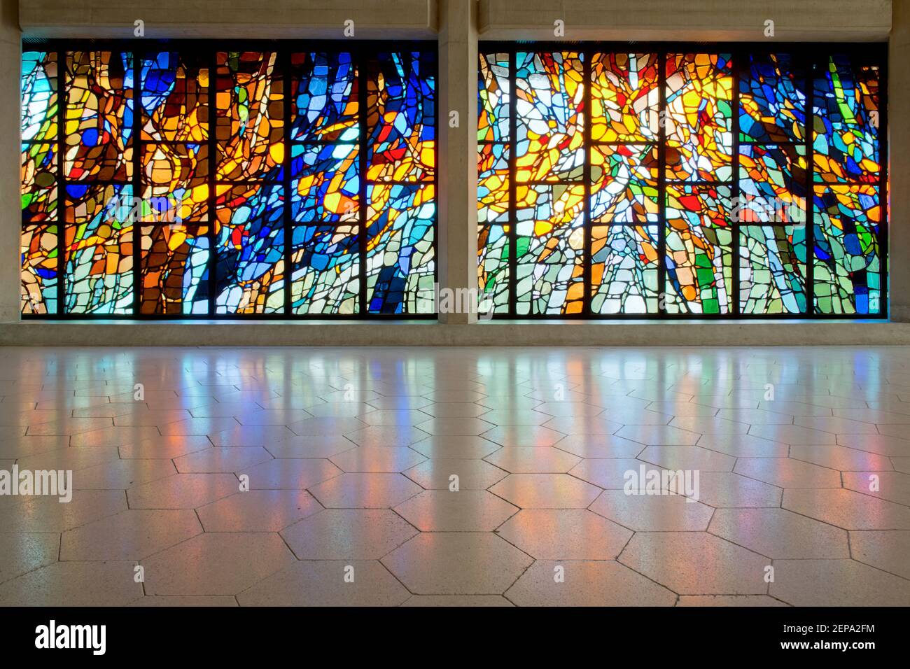A colourful stained glass wall inside Clifton Cathedral, Bristol, UK