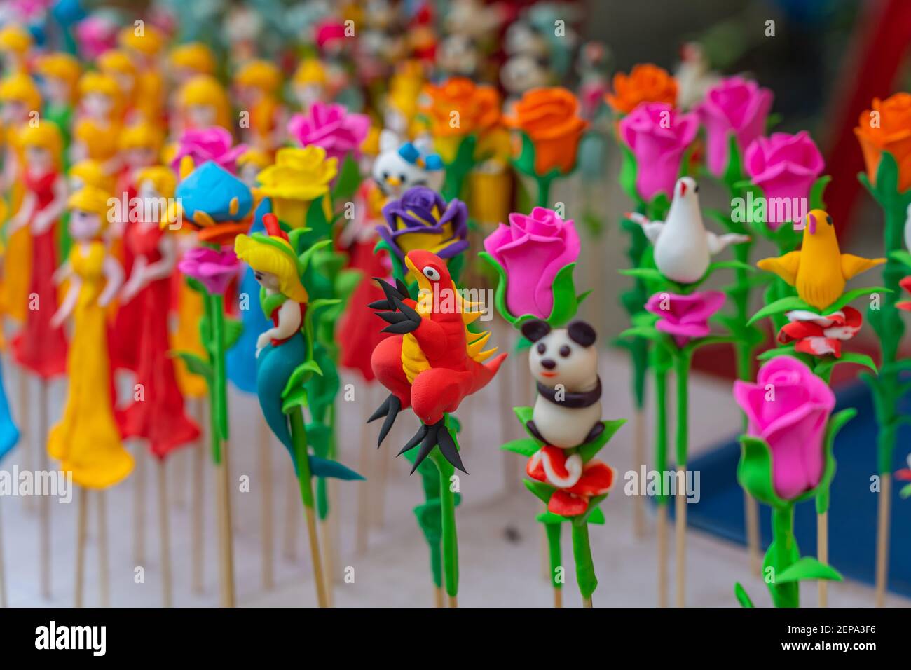 Beautiful sculpture figurines made from dough Chinese street art