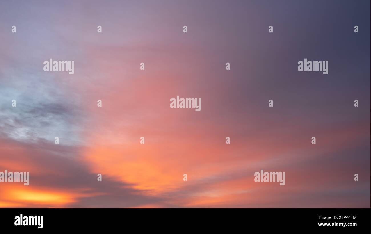 Evening sky with pastel-colored clouds Stock Photo