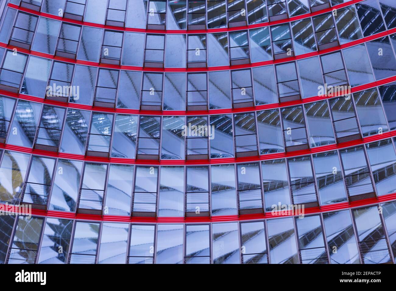Neon colours reflected in the windows of the Sony Centre at Potsdamer Platz, Berlin, Germany. Stock Photo