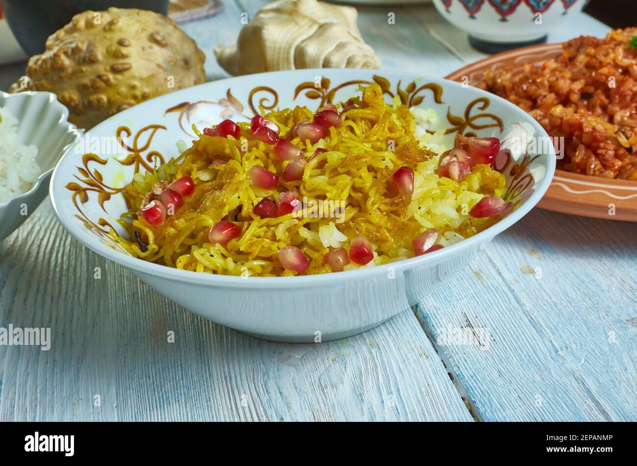 Amiri Khaman with pomegranate, fresh coconut, coriander leaves
