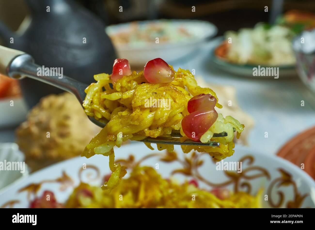 Amiri Khaman with pomegranate, fresh coconut, coriander leaves