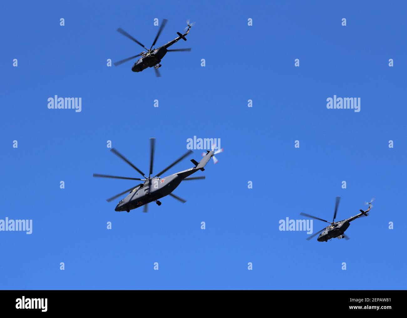 Russian military helicopters fly in formation over Red Square during Victory Day parade, Moscow, Russia. Stock Photo