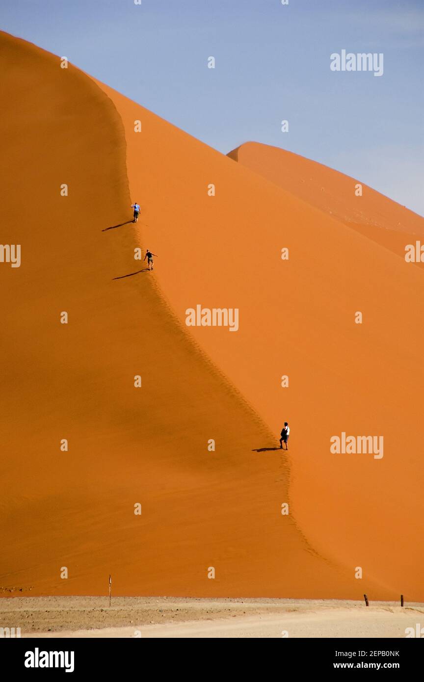Dune hiking on the biggest dunes in the world Stock Photo Alamy