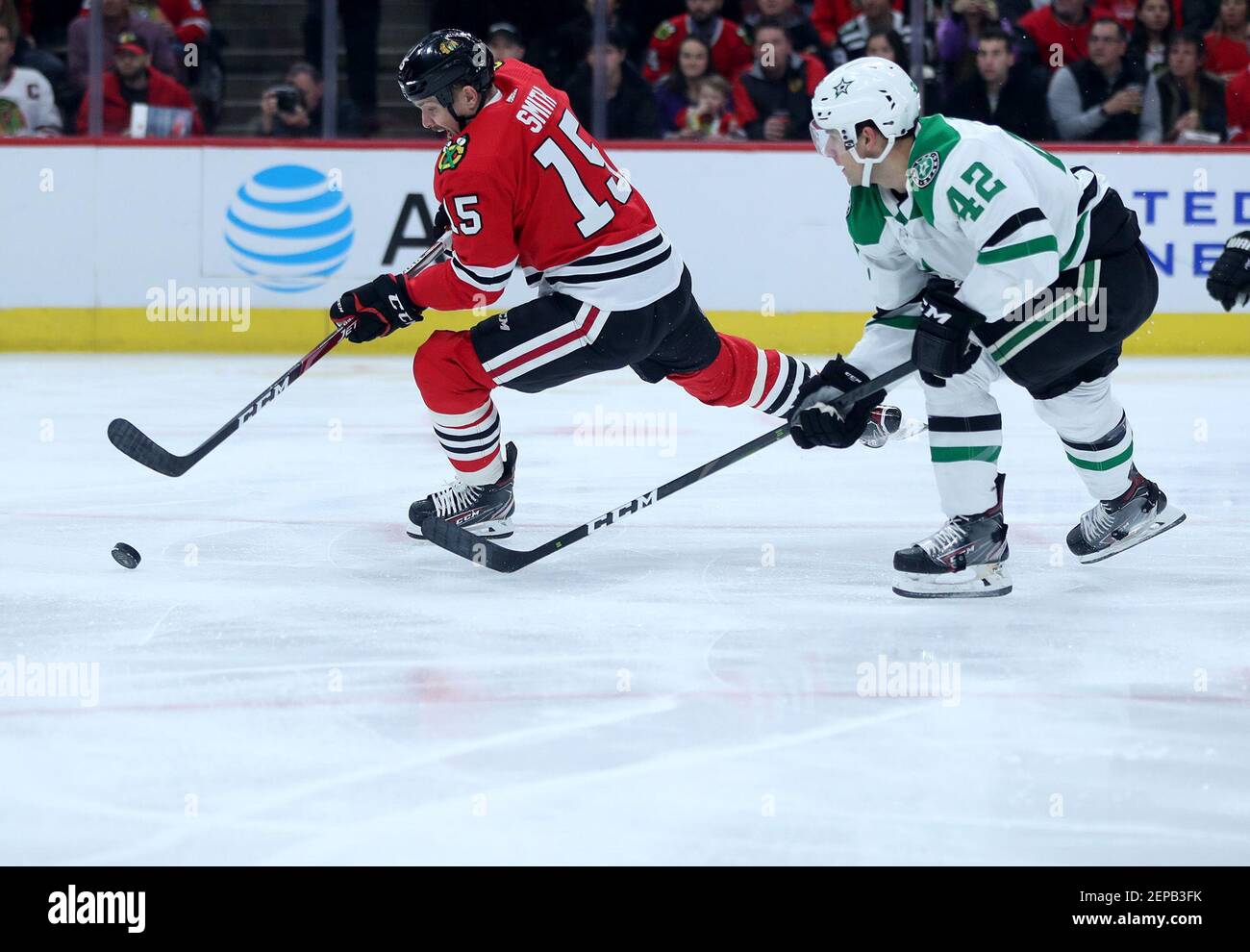 The Chicago Blackhawks' Zack Smith (15) skates in front of the Dallas Stars' Taylor Fedun (42) before taking a shot on goal in the first period at the United Center in Chicago on Tuesday, Nov. 26, 2019. (Chris Sweda/Chicago Tribunet/TNS) Stock Photo