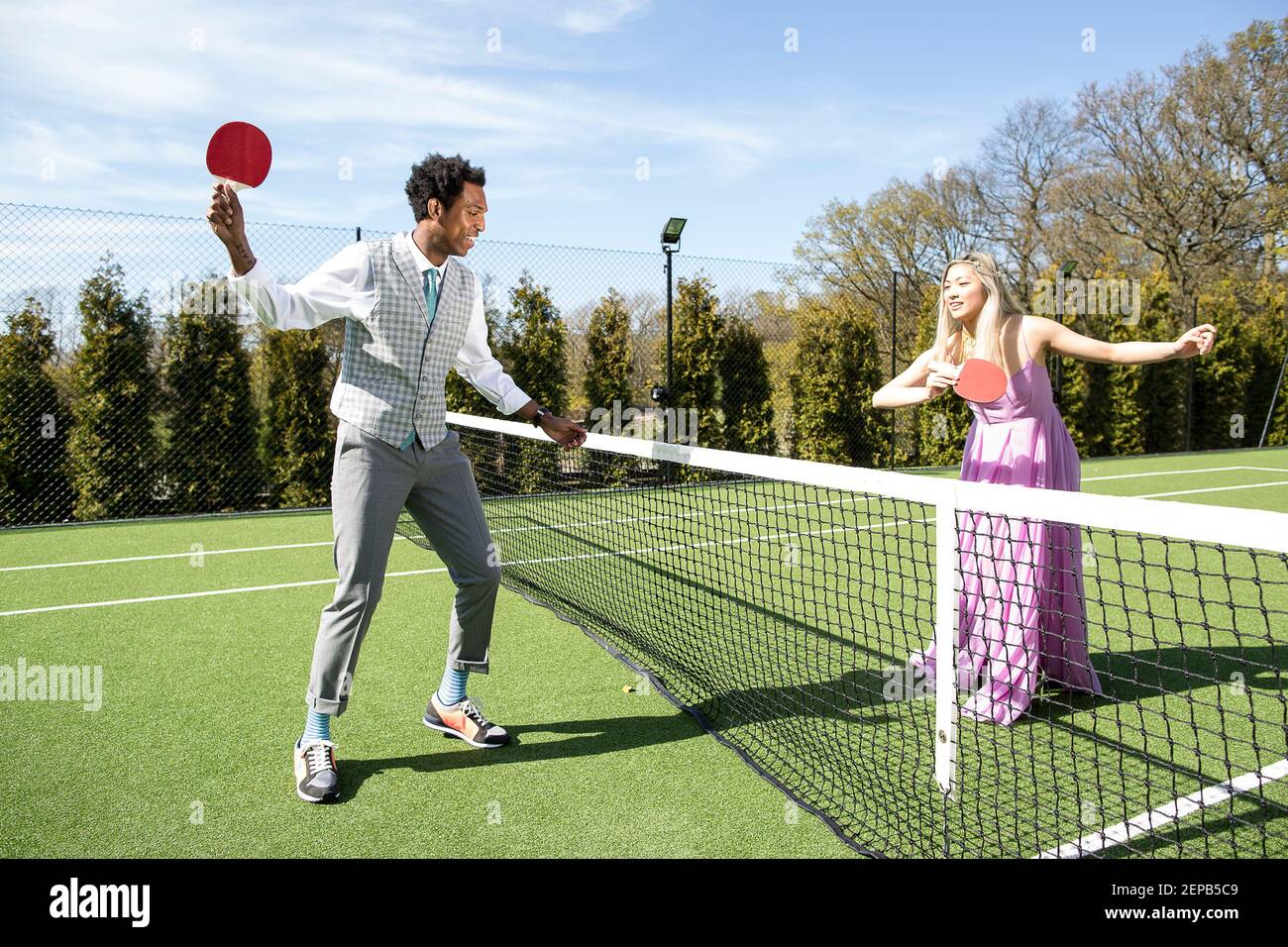 Tennis court fashion story with to models Stock Photo Alamy