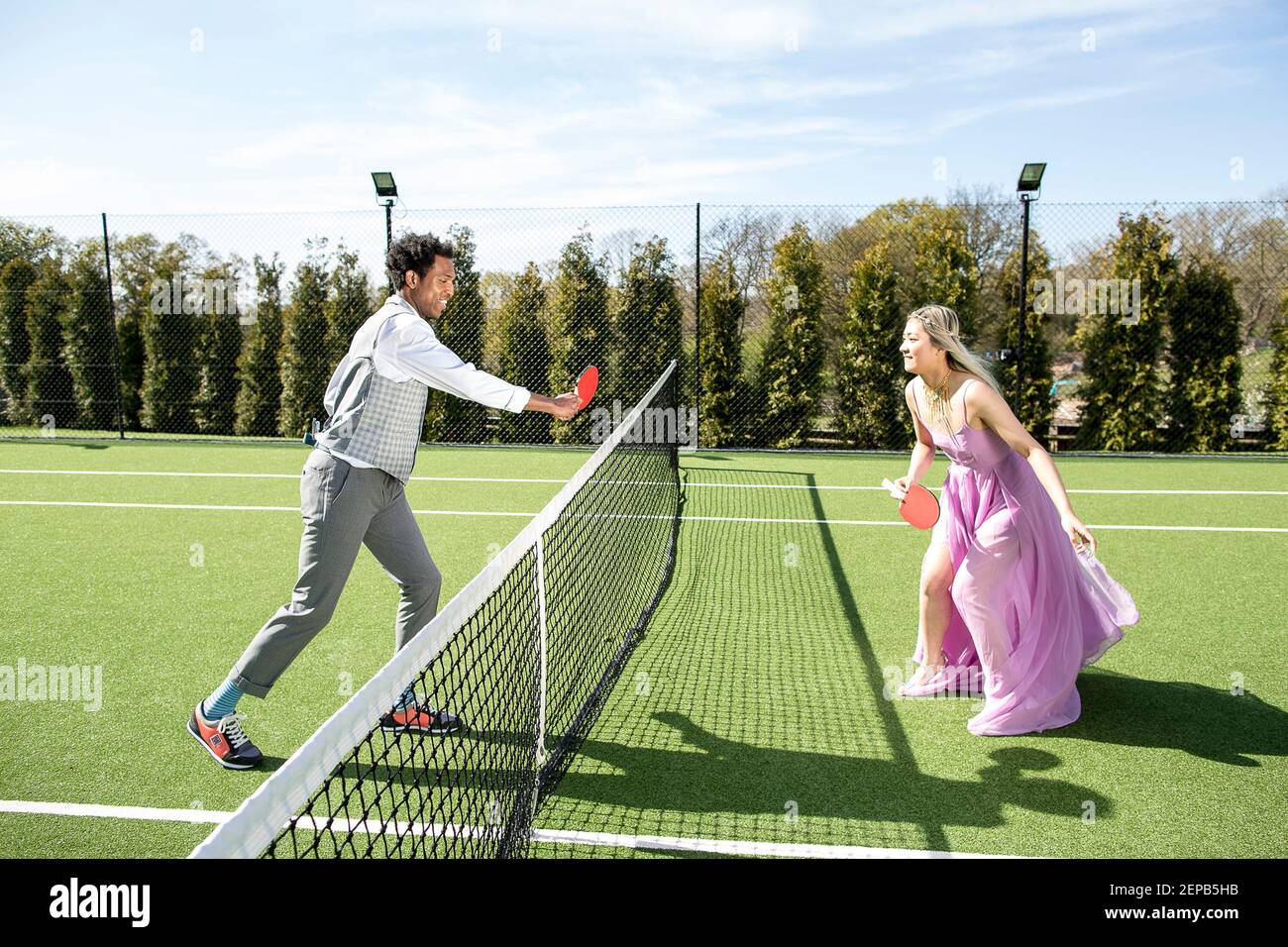 Tennis court fashion story with to models Stock Photo Alamy