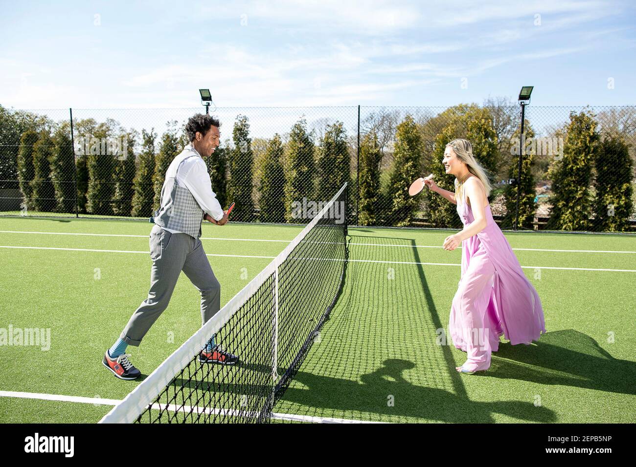 Tennis court fashion story with to models Stock Photo Alamy
