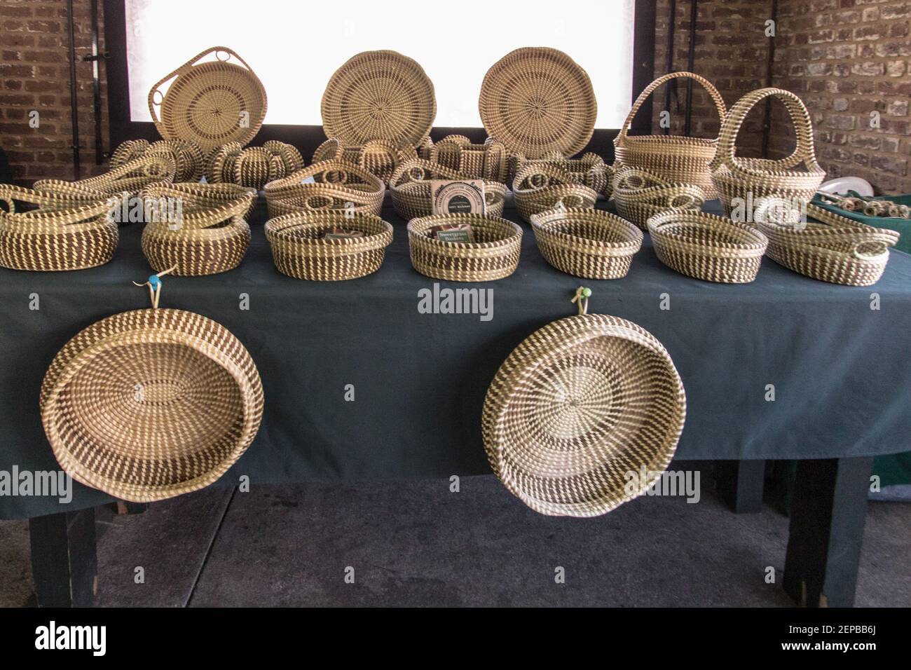Charleston, South Carolina, USA - Hand made  traditional sweet grass basket for sale at the historic Charleston City Market in South Carolina. Stock Photo