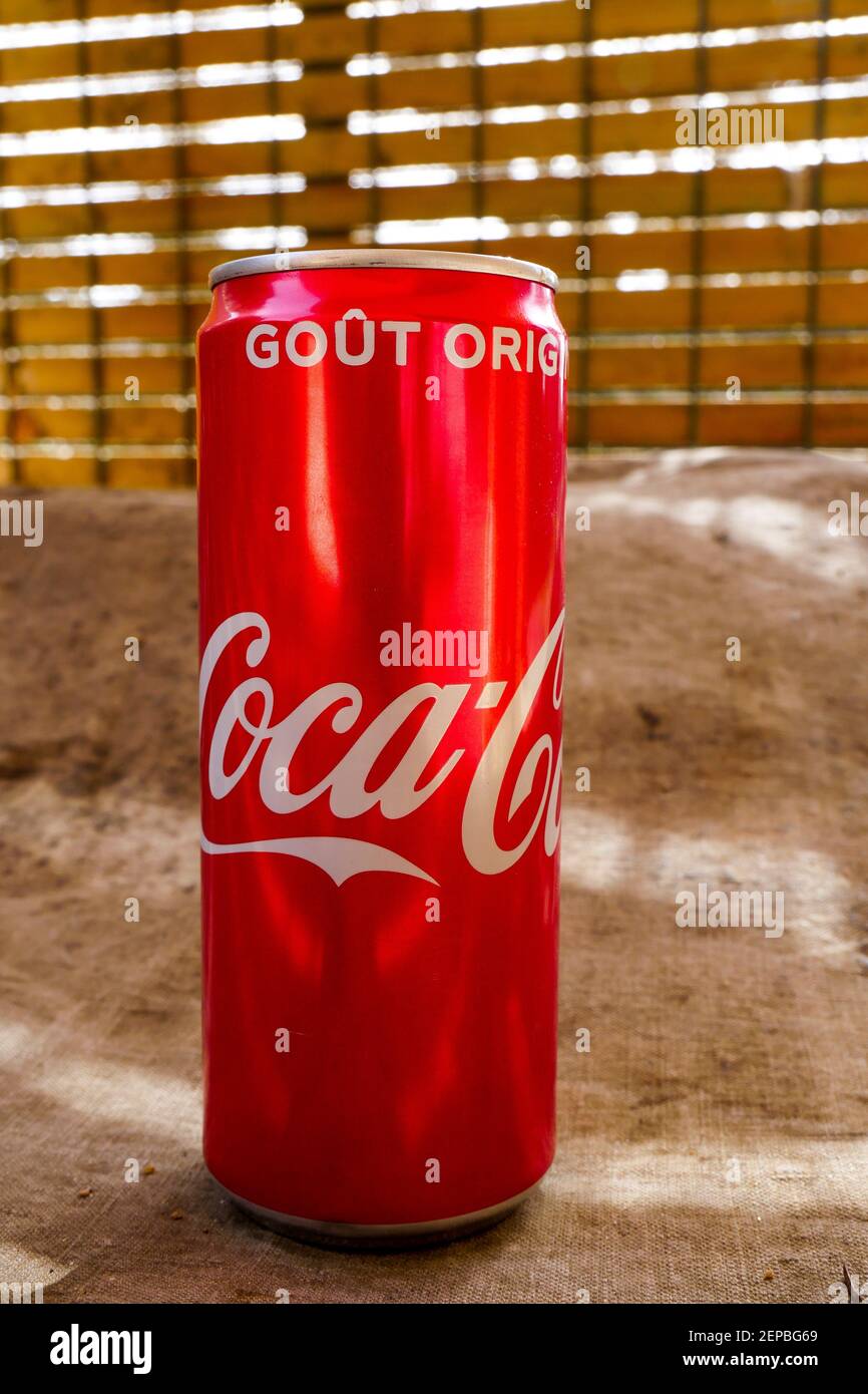 Can of Coca-Cola putted on a vintage canvas tarpaulin, France Stock Photo