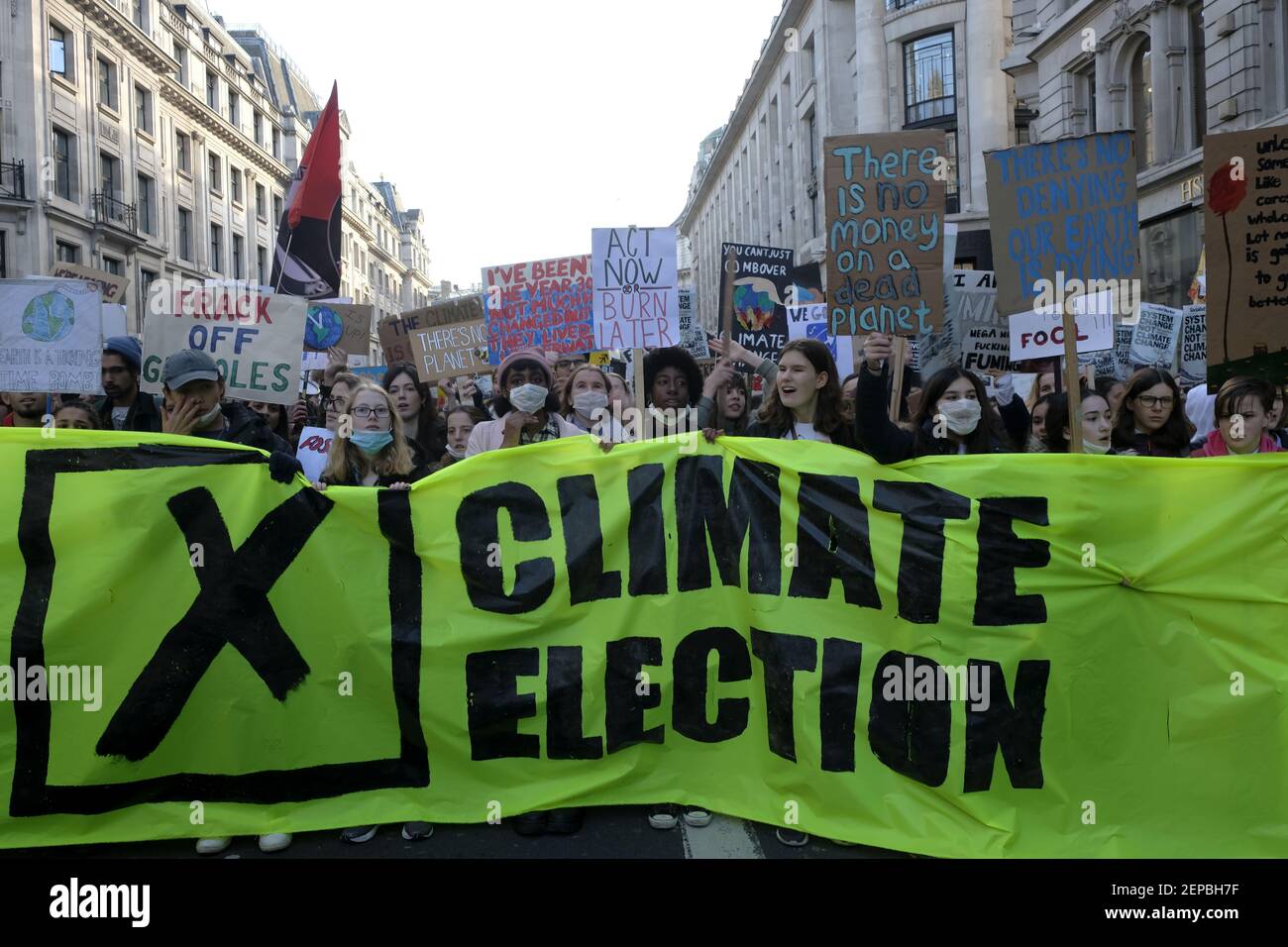 Environment Protest Flags Environmental protesters holding a large banner and placards while ...