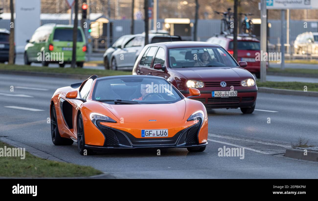 Warm spring days bring luxury cars back to German streets after short winter break. A McLaren 570S convertible seen in Wolfsburg. Stock Photo
