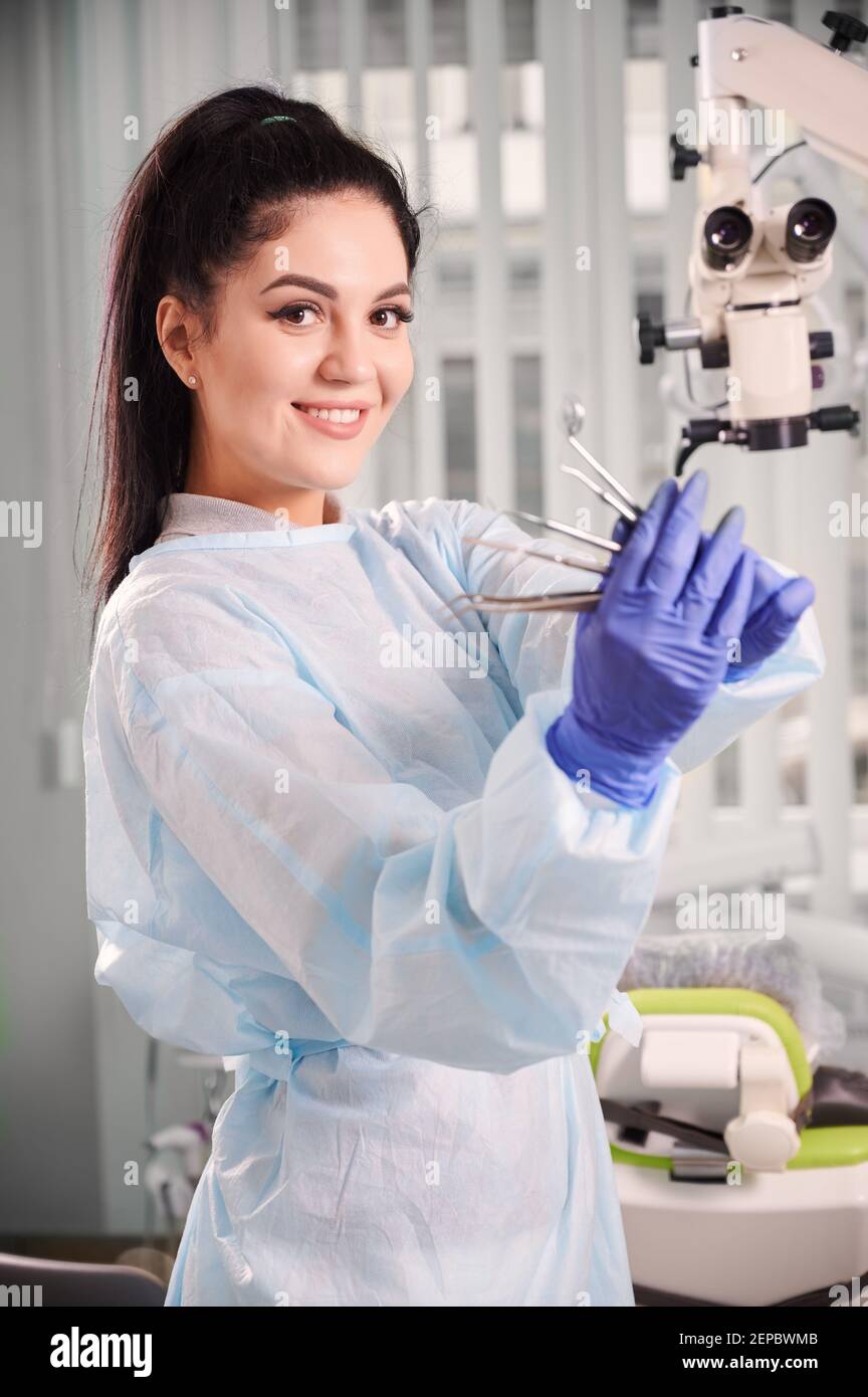 Close up portrait dentist holding hires stock photography and images