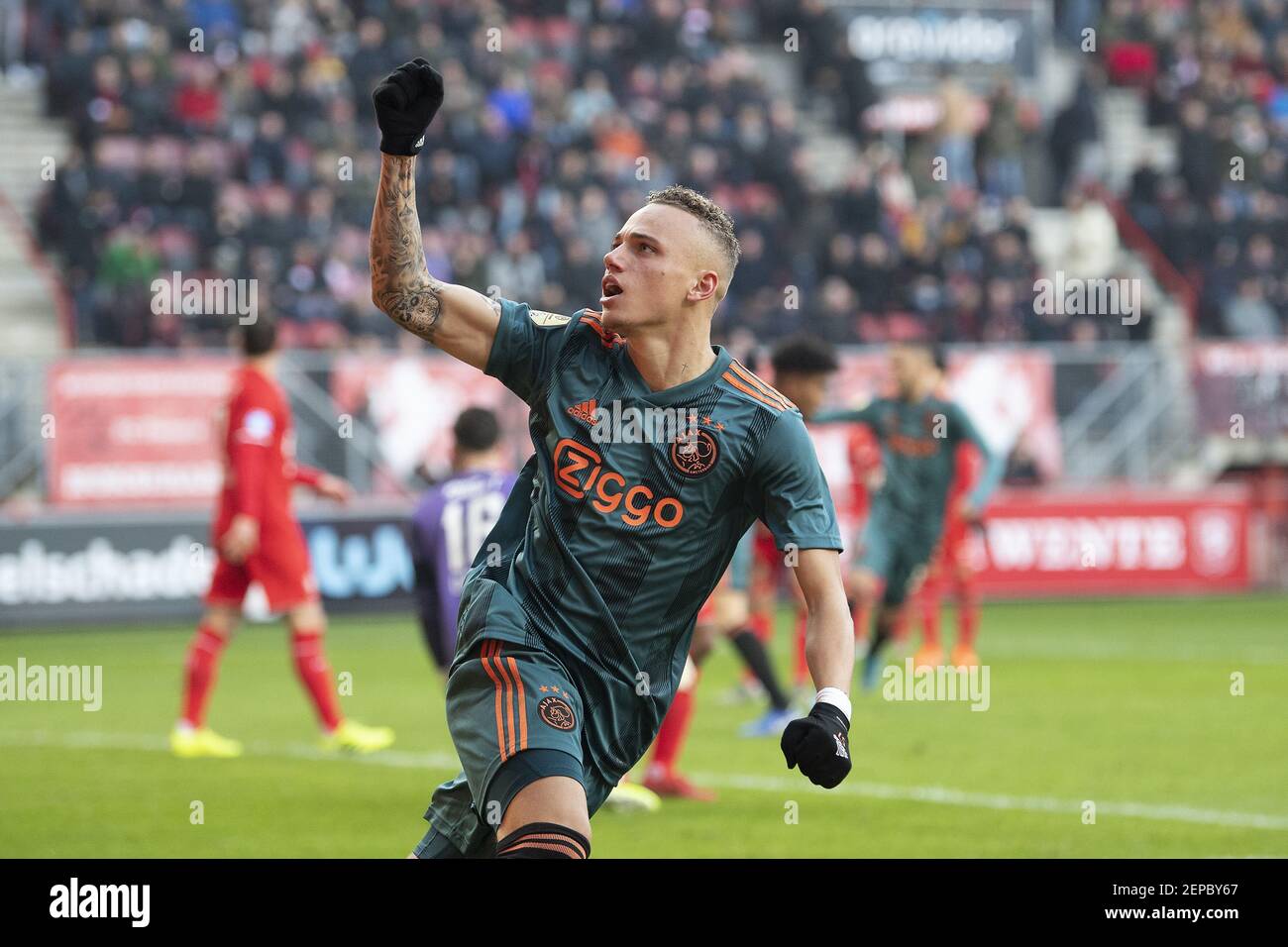 ENSCHEDE, 01-12-2019 , Grols Veste , Dutch Eredivisie Football season 2019  / 2020 . Ajax player Noa Lang celebrating the 2-2 during the match FC  Twente - Ajax (Photo by Pro Shots/Sipa USA Stock Photo - Alamy