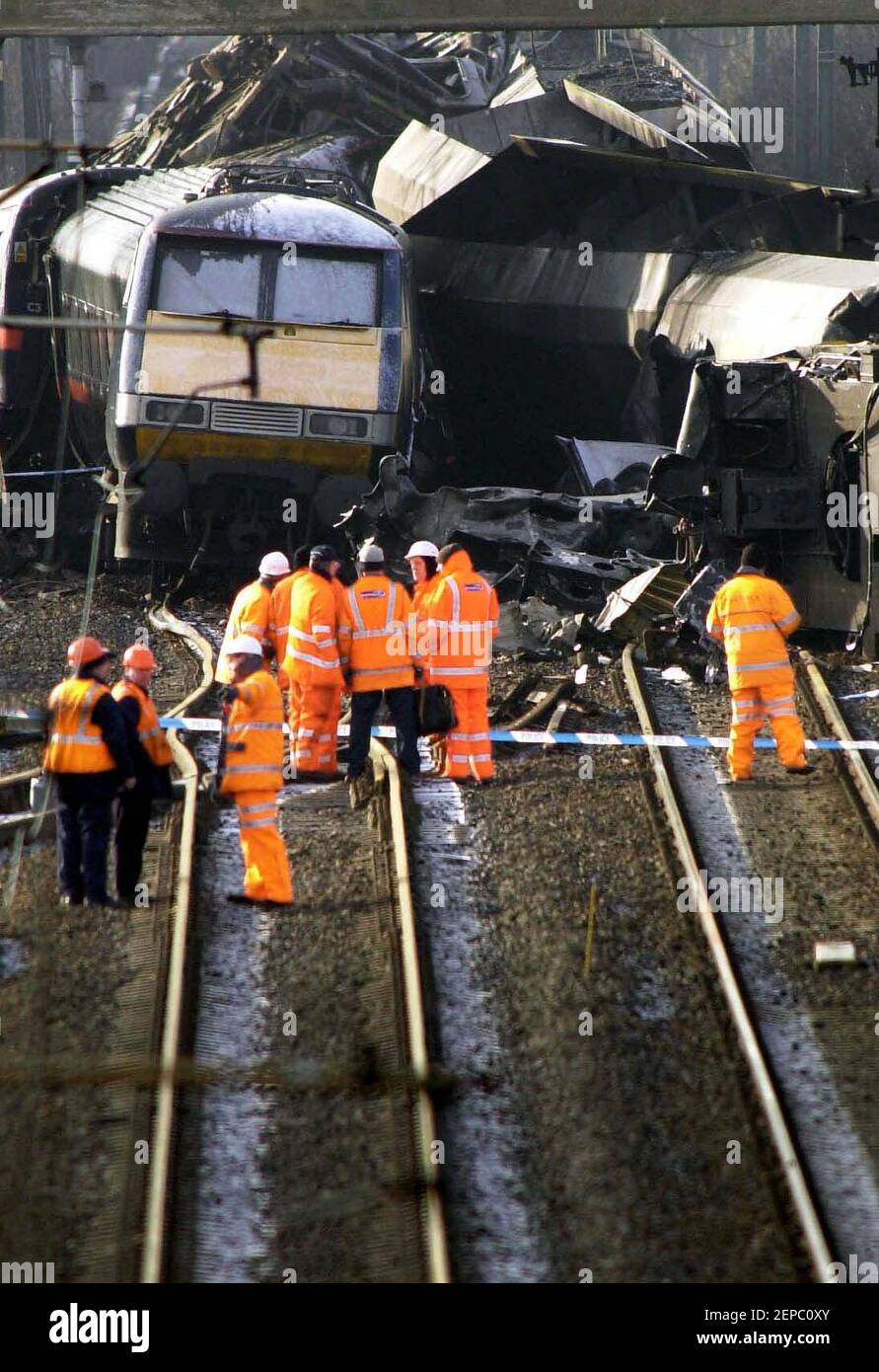 File photo dated 01/03/01 of rail officials inspecting the site of the horrific train crash in Selby North Yorks, where two train drivers, two others GNER staff and six passengers died on February 28 2001, after the Newcastle to London passenger service struck a Land Rover which had careered off the M62 motorway and crashed onto the track. Stock Photo
