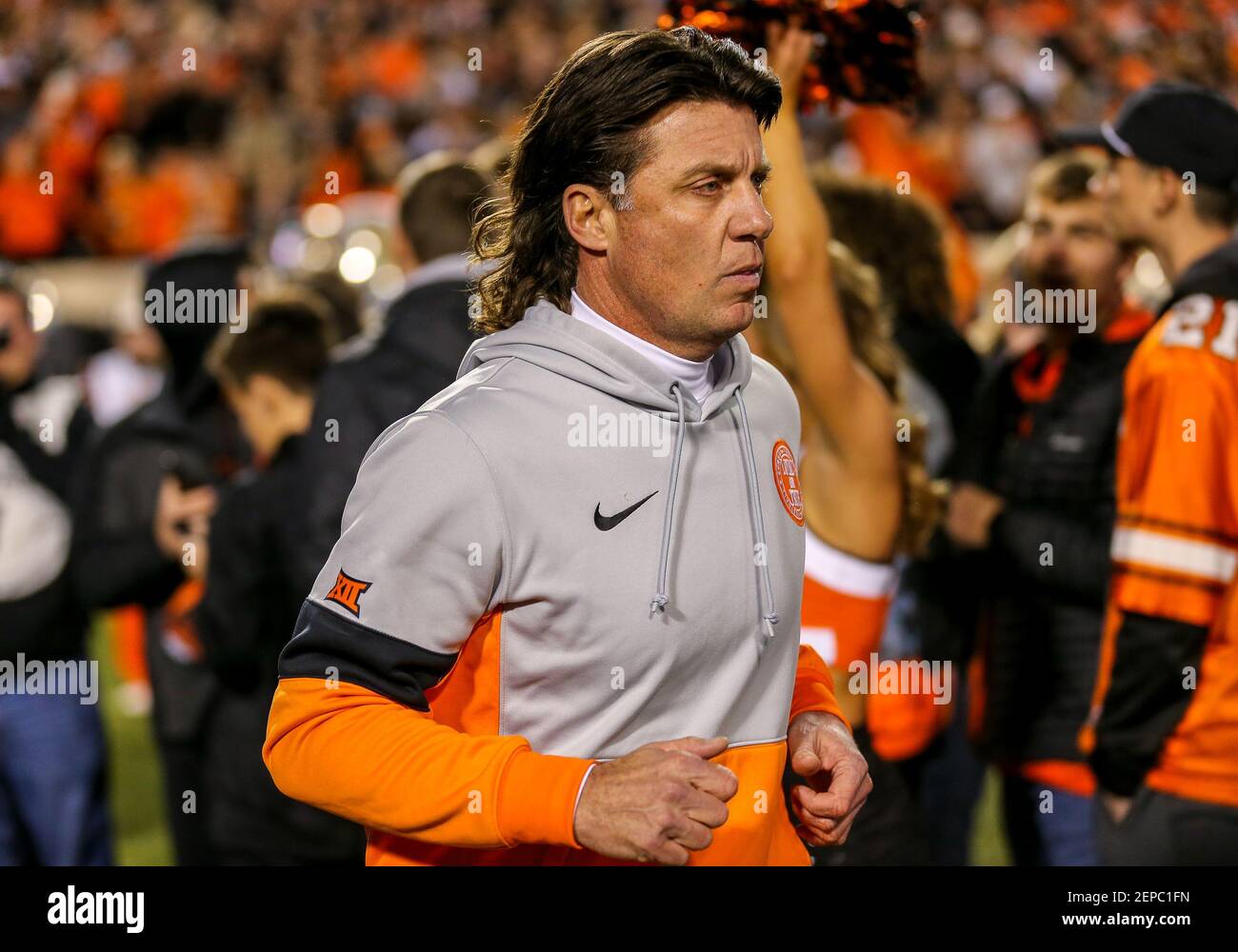 November 30, 2019: Oklahoma State Head Coach Mike Gundy takes the field  before a football game between the University of Oklahoma Sooners and the  Oklahoma State Cowboys at Boone Pickens Stadium in