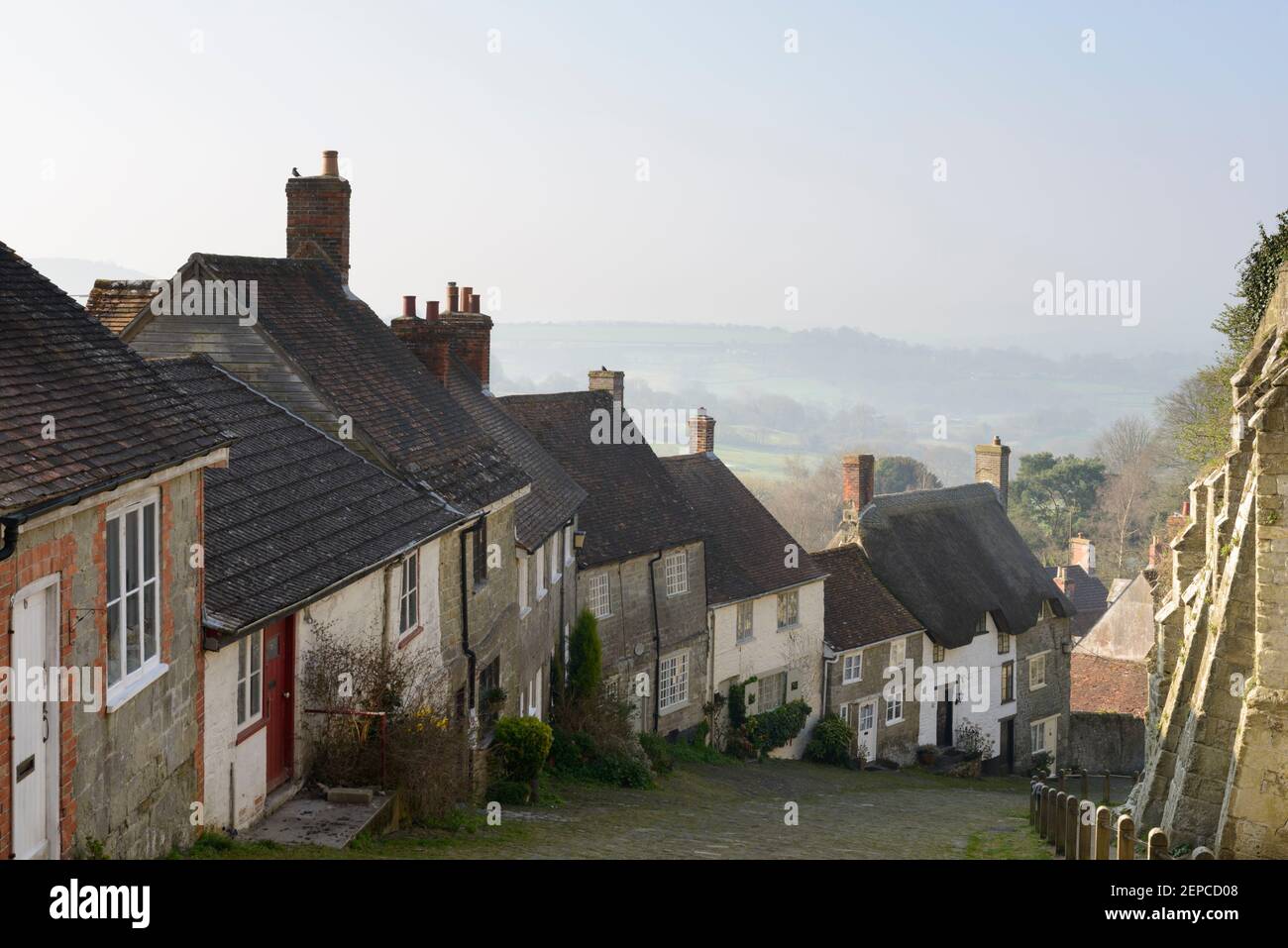 Cottages on the steep slope of Gold Hill, Shaftesbury, Dorset, UK. Stock Photo