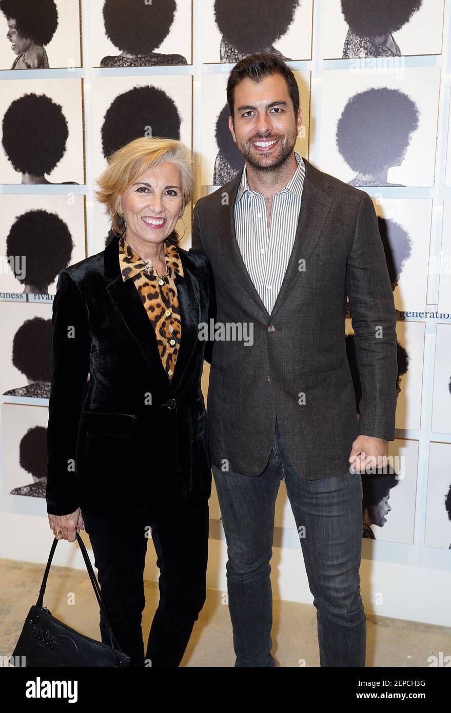 MIAMI, FL - DEC 2: Rosa Sugra–e and Nando VIla are seen during El Espacio  Twenty Three Gallery to view Jorge M. Perez private art collection during  Art Basel Miami on December