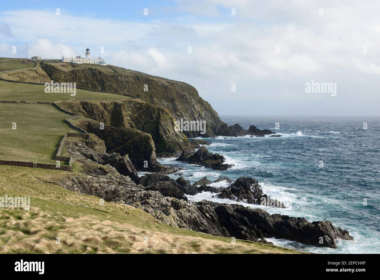 Sumburgh Head lighthouse, built by Robert Stevenson, at the southernmost tip of Shetland. Stock Photo