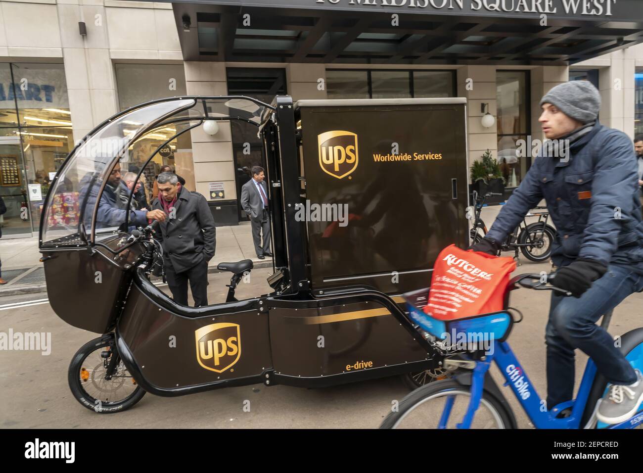 Both UPS branded and Amazon cargo bikes are demonstrated at a media event  in the Flatiron neighborhood of New York on Wednesday, December 4, 2019.  The program, which also involves DHL, is focused on reducing congestion on  Manhattan's streets ...